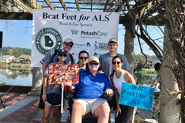 Man with ALS with family