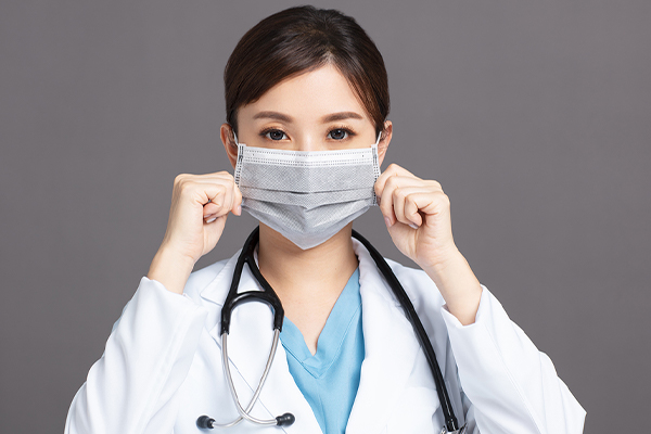 Female doctor wearing a mask