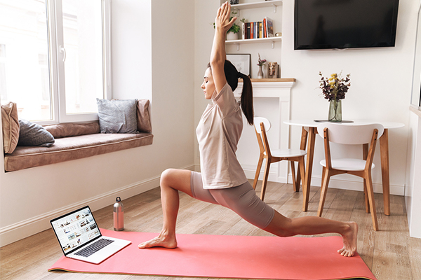 Woman doing yoga at home