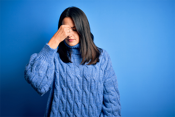 Young woman with a headache