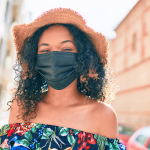 Black woman wearing a mask