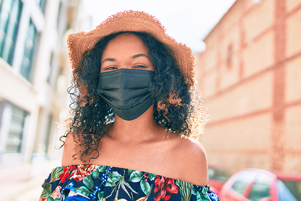 Black woman wearing a mask