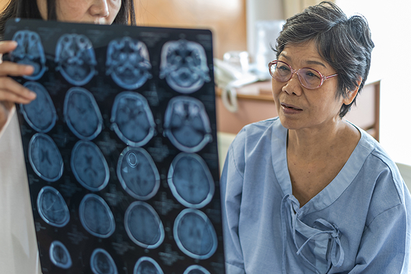 Older Asian woman at the doctors office