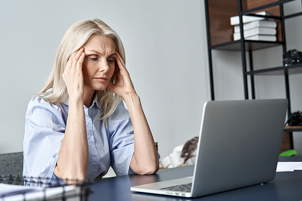 Woman stressed out at work