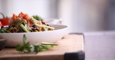 A bowl of food on a table