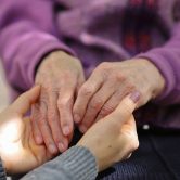 two people holding hands