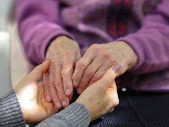 two people holding hands