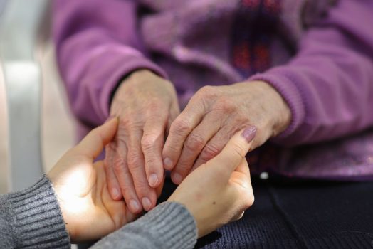 two people holding hands