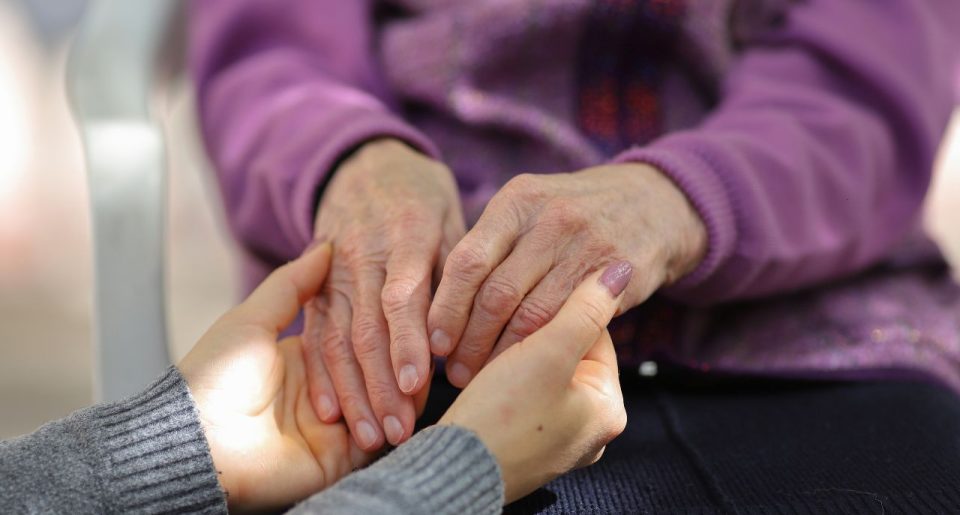 two people holding hands