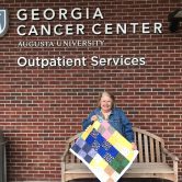 woman holding a blanket