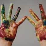 hands with paint