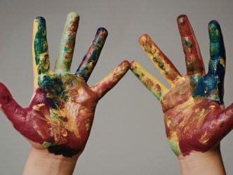 hands with paint