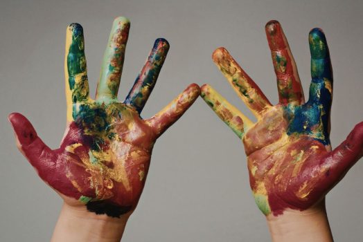 hands with paint