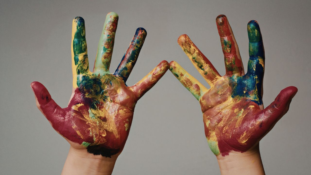 hands with paint